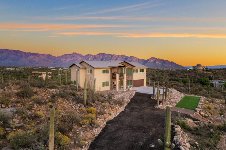 Completed Good Boy Builders custom home in a desert landscape